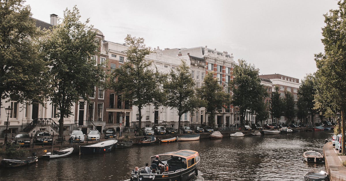 Traditional Dutch canal houses in Amsterdam Netherlands European city