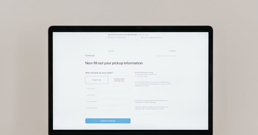 Laptop displaying online checkout form for digital payment processing