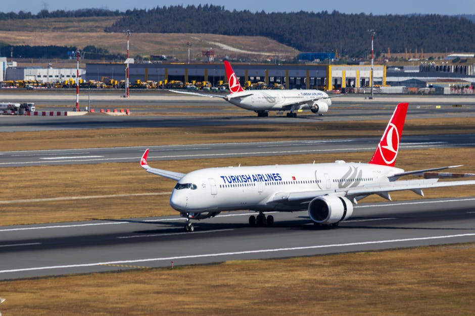 Turkish Airlines aircraft on the runway at Istanbul Airport, showcasing aviation and travel transportation.