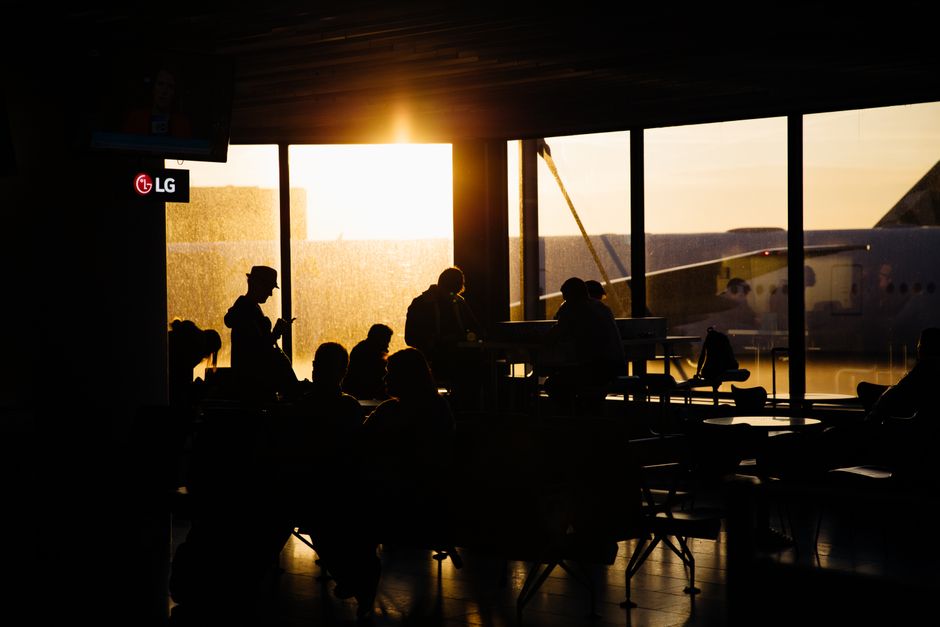 Passengers waiting during December Europe travel strikes at an airport