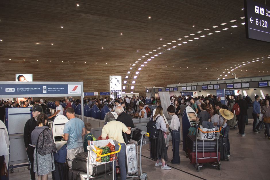 Travellers at an airline service desk claiming rights for a cancelled flight
