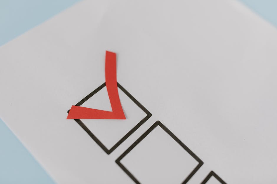 Checklist being ticked off on a clipboard