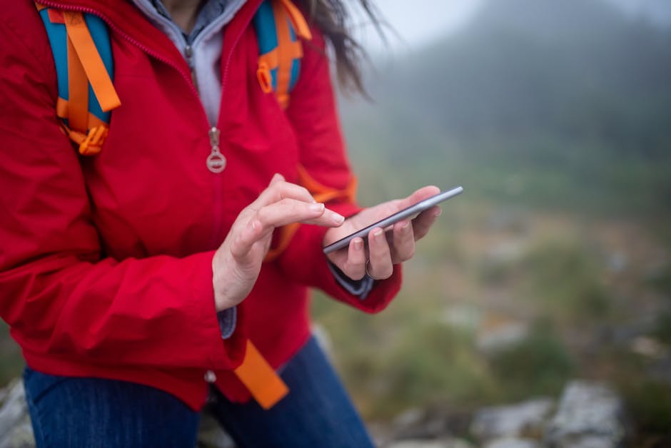 Traveller checking dates on a smartphone app