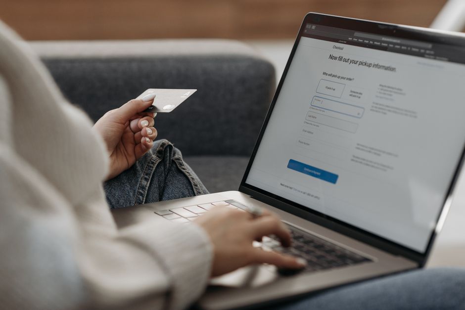 Person entering card details on a secure website