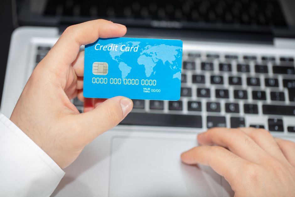 Close-up of a credit card being used for an online payment