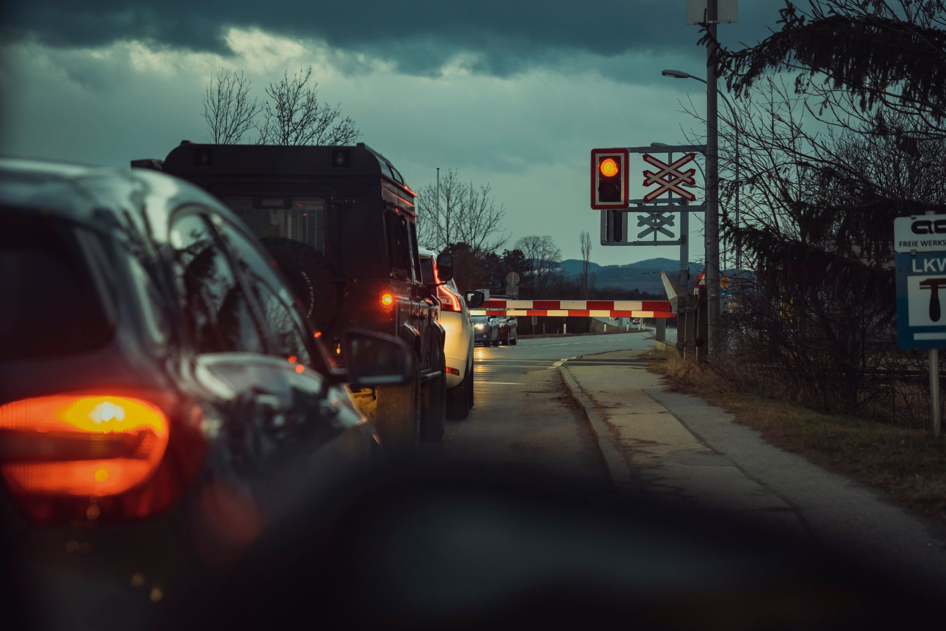 Line of cars queueing at a road border crossing control point