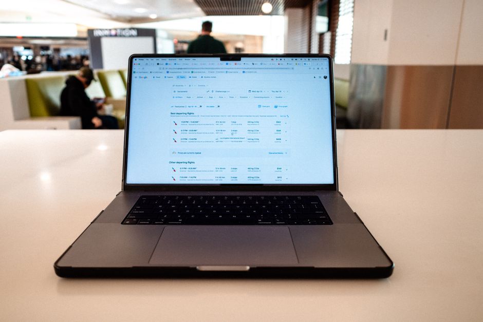 Person entering passport details online to track a Europe travel authorisation