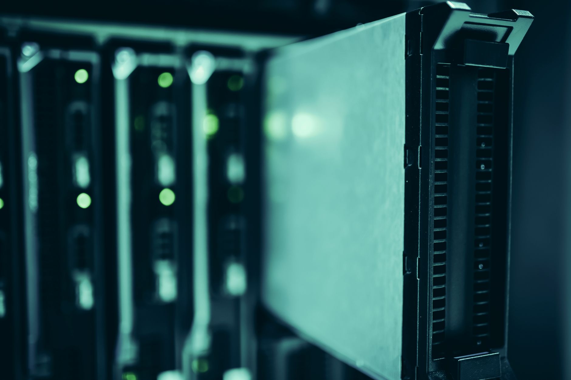 Rows of servers in a secure data centre storing large-scale digital records