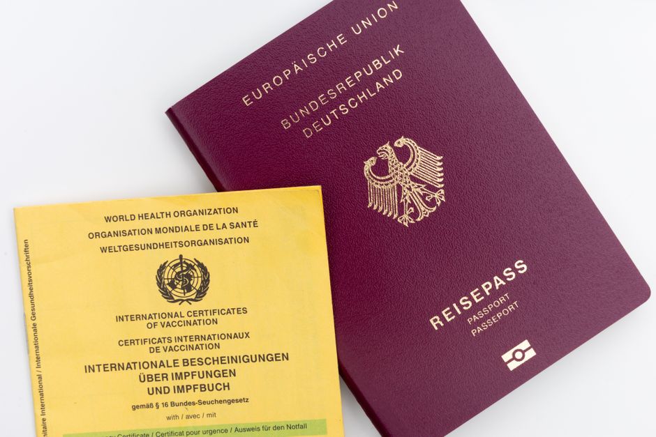 Resident organising passport and residence documents for European travel