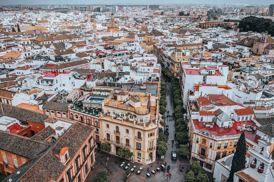 Seville cathedral and Giralda tower seen by visitors planning ETIAS travel