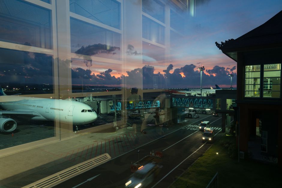 Traveller waiting in an airport lounge on a long European layover