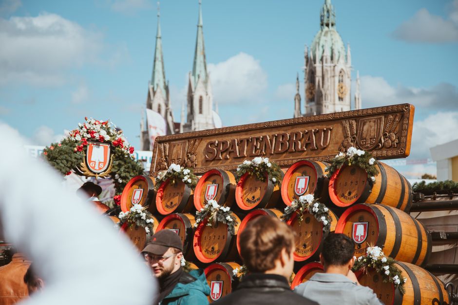 People in Bavarian dirndl and lederhosen at Munich Oktoberfest festival