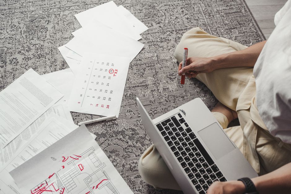 Traveller marking a calendar while planning a European trip and ETIAS application timing